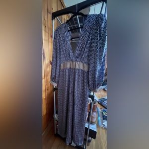 Zara jumpsuit with floral print.